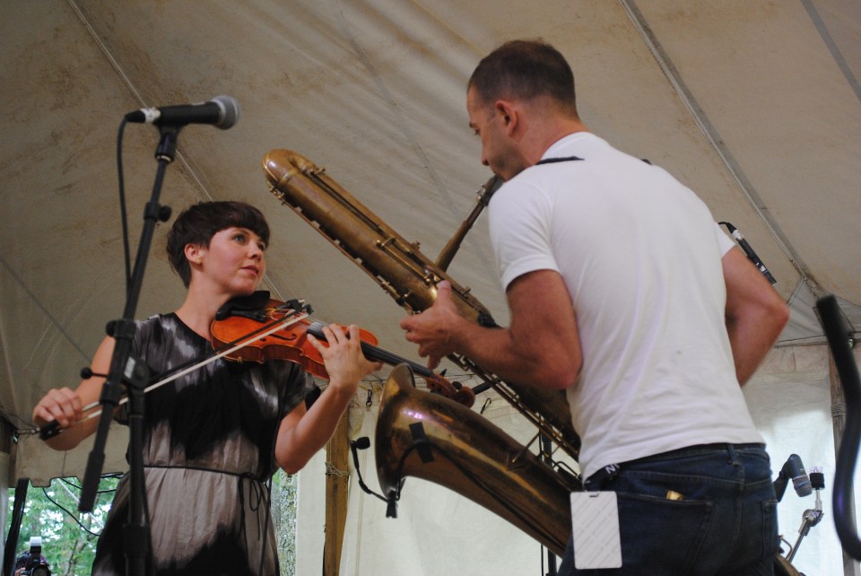 Sarah Neufeld (left) brought life partner and Arcade Fire/Bell Orchestre bandmate Colin Stetson (right) onstage for a special performance of "Breathing Black Ground" amid a set of her solo material at Hillside Festival in Guelph, Ont. July 28. Photo: Tom Beedham