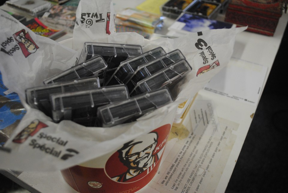 Cassettes overflow a KFC bucket display atop a table for Sonic Boom’s Cassette Fair held Sept. 7. The event was held in honour of the first annual international Cassette Store Day, where Weird Canada spoke of plans to feature cassette releases in its upcoming FACTOR grant-funded distribution service. Photo: Tom Beedham