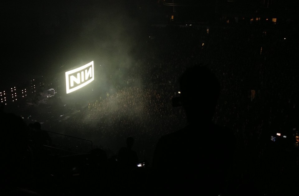 Part of a dynamic light show, an LED wall separating fans from Nine Inch Nails blasts fans with the band's minimal "NIN" logo toward the end of the Toronto stop of its Tension 2013 tour at Air Canada Centre  on Oct. 4, 2013. Photo: Tom Beedham